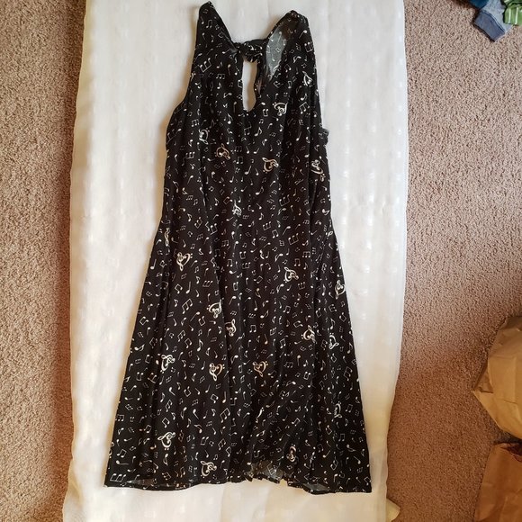 torrid Dresses & Skirts - Nwot torrid black music note dress with tie back. Size 14